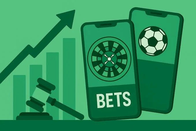 Ilustração em tons de verde mostrando dois smartphones com aplicativos de apostas esportivas, um com uma roleta e a palavra 'BETS' e outro com uma bola de futebol. Ao lado, há um martelo de juiz e um gráfico de barras com uma seta ascendente, simbolizando o crescimento e a regulamentação do mercado de apostas.